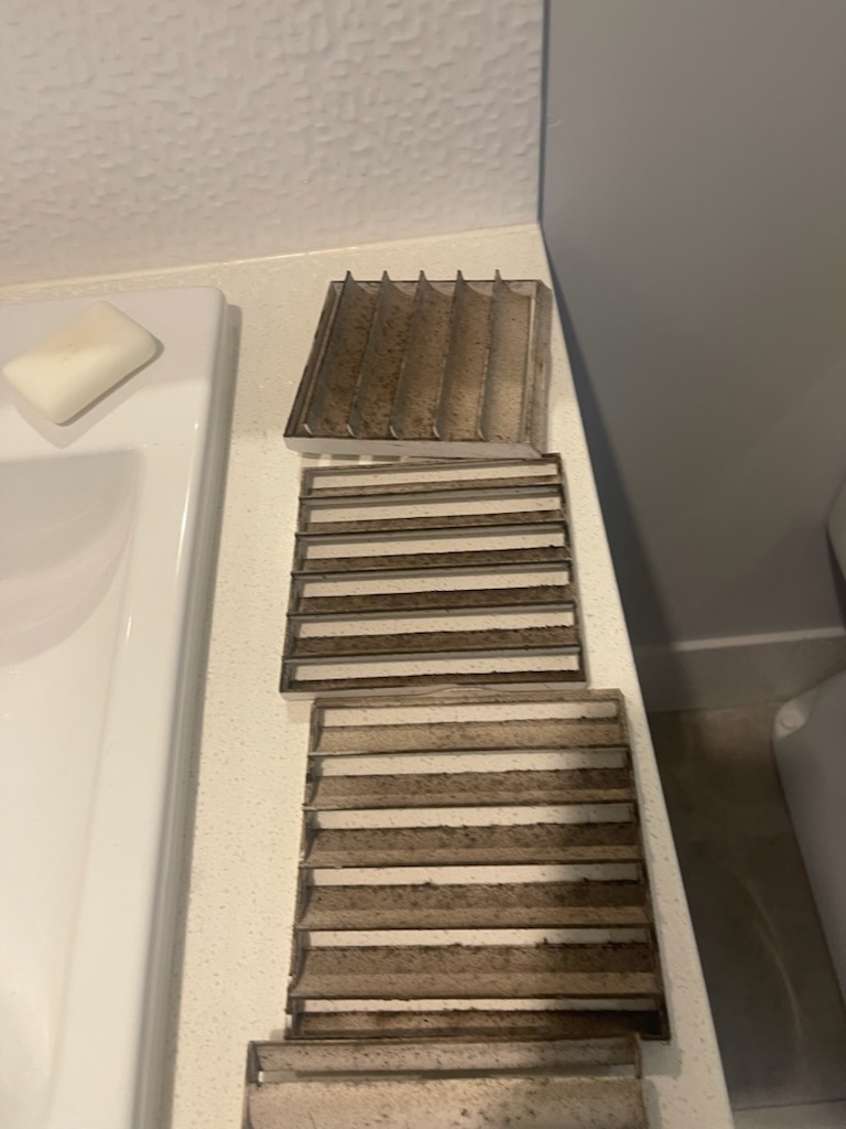 Vent covers before cleaning